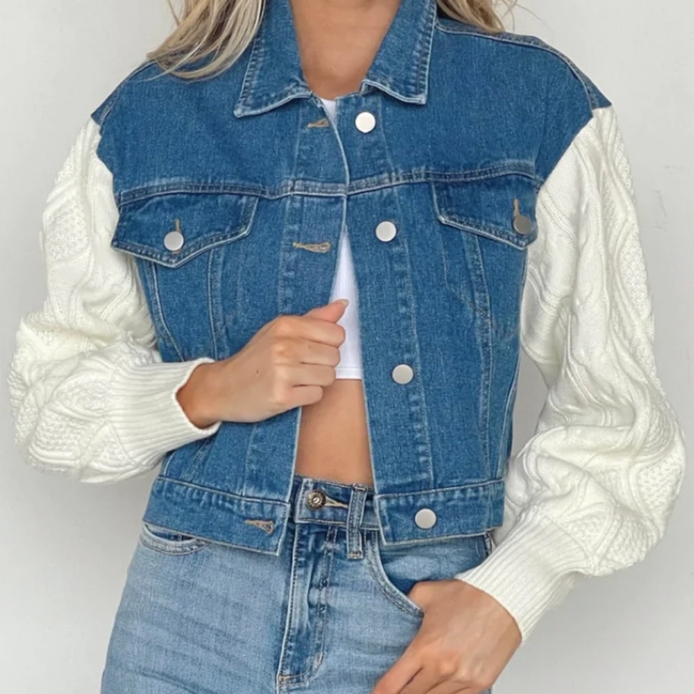 Vestique denim jacket with cable sweater sleeves